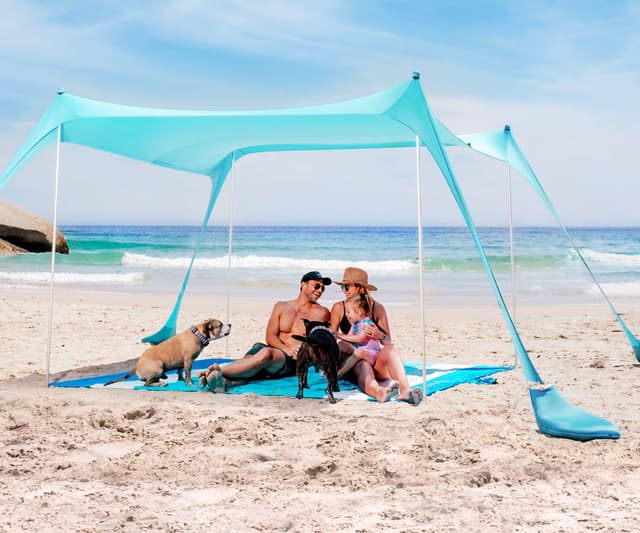 SUN NINJA Strandzelt mit UPF50+ - Sonnenschutz Strand Sonnensegel mit Sandschaufel & Erdnägeln - Strandmuschel Baby UV Schutz 50 - Beach Tent 8 Person - Türkis