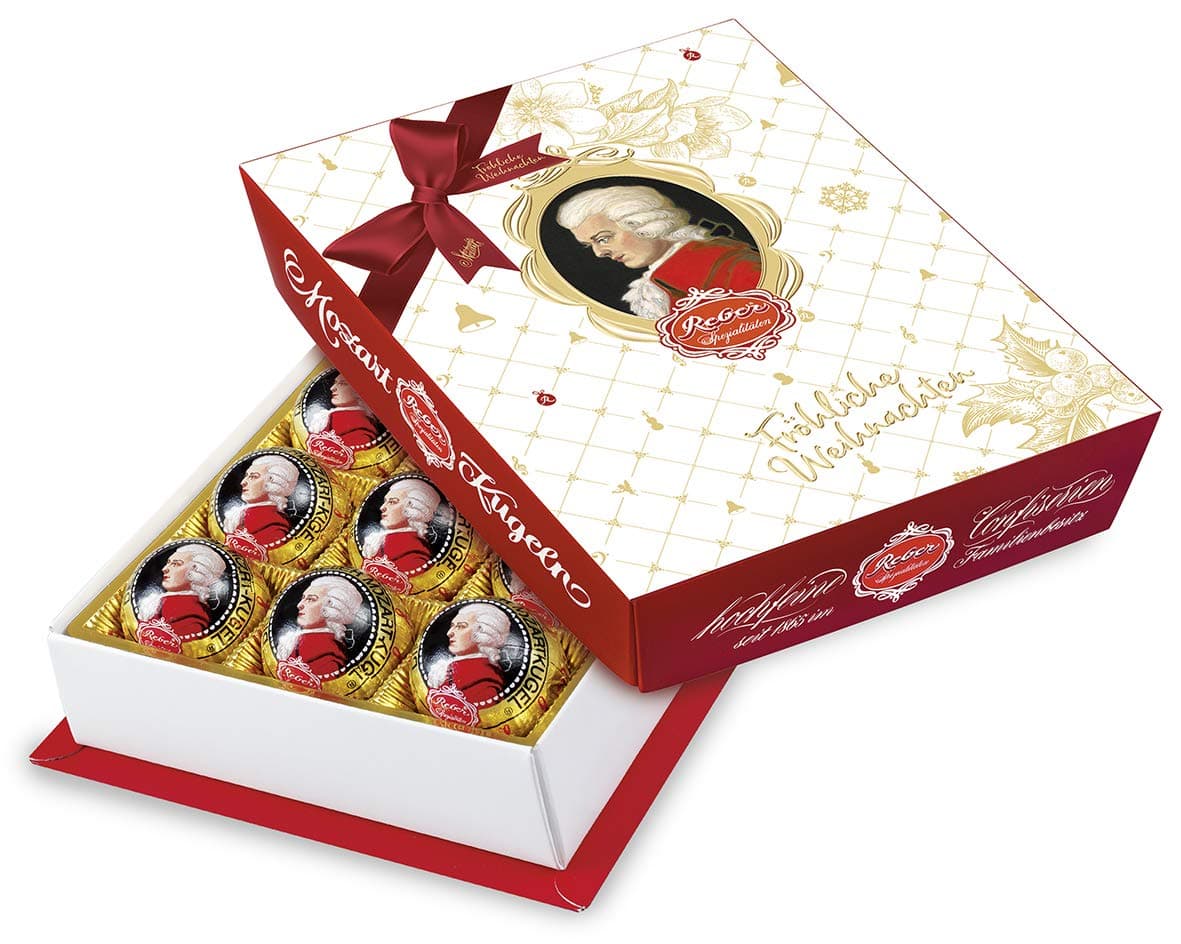 Reber Mozart-Barock – 12er Packung in der Weihnachts-Edition – Echte Reber Mozart-Kugeln aus Zartbitter-Schokolade, Marzipan und Nougat Angebot bei HelloDeals